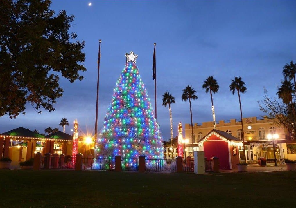 The Chandler Tumbleweed Christmas Tree glowing in Downtown Chandler at night.